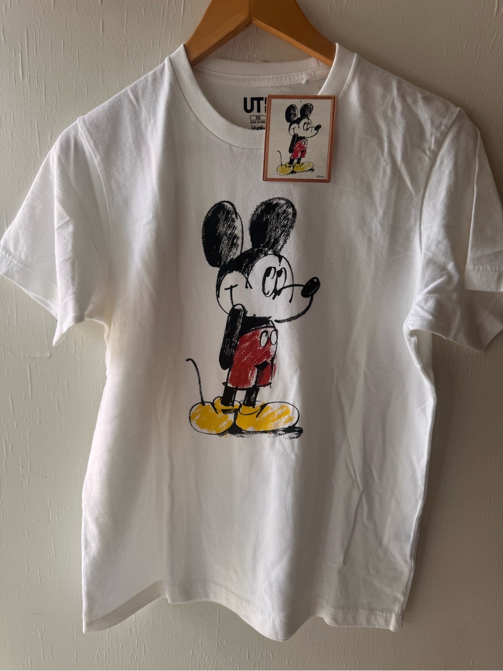 Uniqlo White Short-Sleeve Tee with Sketch Mickey and Red, Yellow Accents